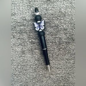 Black and purple butterfly pen